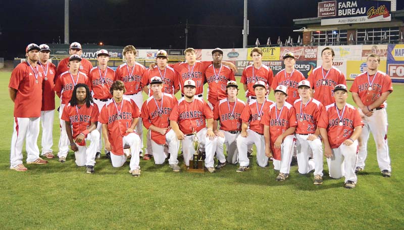 Daily Leader / Photos by Marty Albright / The Loyd Star Hornets pose with the Class 2A state runner-up trophy Saturday at Trustmark Park.