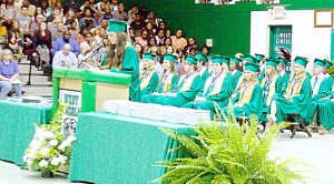 West Lincoln graduates listen attentively to one of the speakers at the West Lincoln Attendance Center graduation ceremony Friday night.