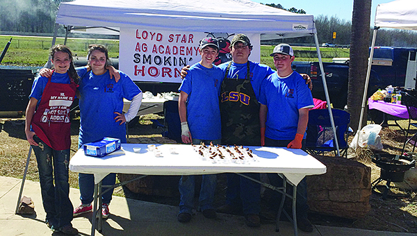Photos submitted / Harlee Davis, Sarah Beth King, Zach Jenkins, Sam Edwards and Noah LeCompte take a quick break during a competition. The five students have worked hard to have a successful first year.