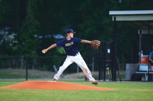 Photo by Anthony McDougle/ The starting pitcher for the 13- and 14- year-old Bogue Chitto team winds up to deliver a pitch during a contest against Brookhaven Academy Thursday night. Brookhaven Academy defeated the Bobcats 9-1 in the contest.