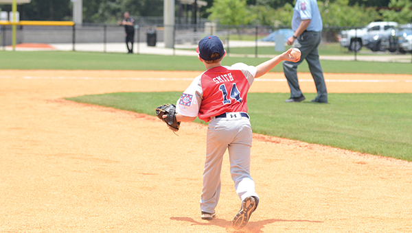 Photo by Anthony McDougle/ American third baseman Graham Smith makes a throw to second during a contest against the Natchez All-Stars at the Lincoln Civic Center Baseball Complex on Saturday. The Lincoln County American All-Stars lost the game 15-14.