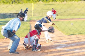 Photo by Anthony McDougle/   Bogue Chitto’s J.J. Mccaffrey tries to lay down a bunt in a contest against Loyd Star.  