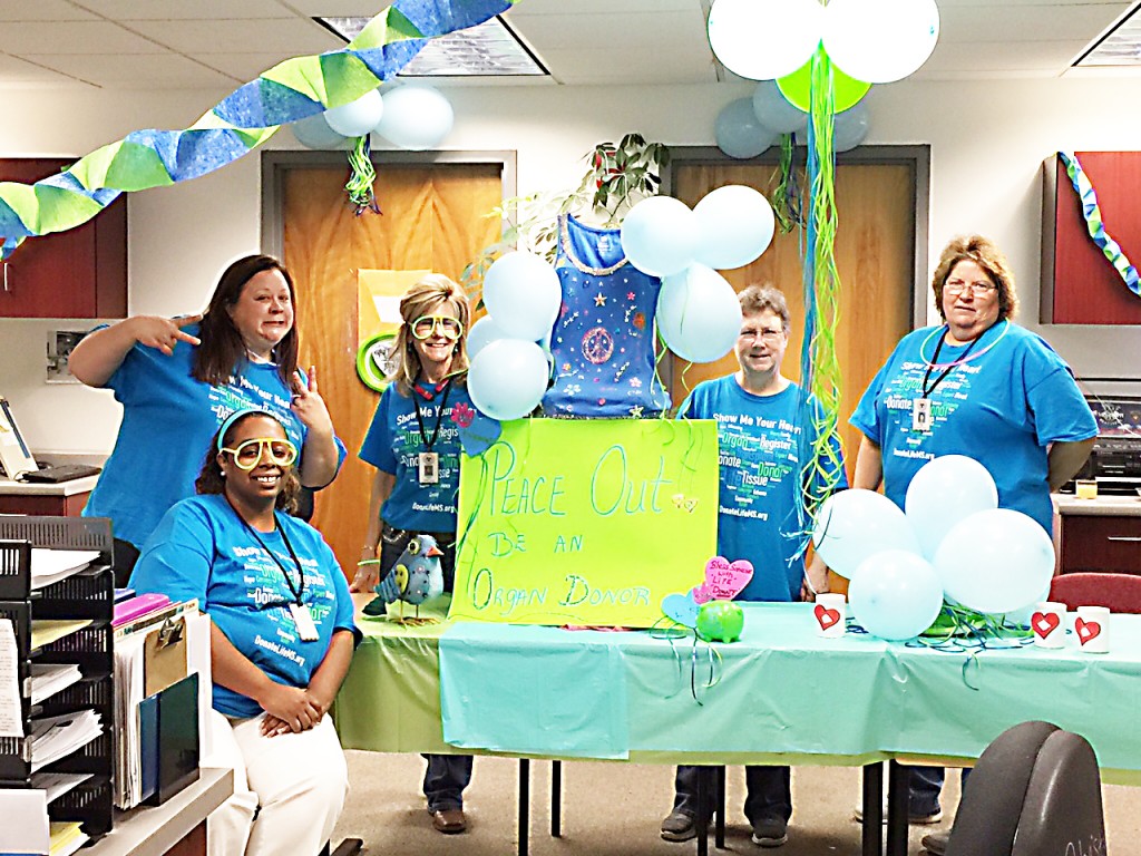 Photo submitted  /The Brookhaven Department of Public Safety’s driver’s license office won the Red Heart award last week during the Mississippi Organ Recovery Agency’s third annual Spero Awards. Tonya Jones (left) Cynthia Phillips, Christine Cloy, Lucye Moore and Paula Smith are shown in the Brookhaven office, which they decorated for Blue and Green Day in April during National Donate Life Month. Not pictured are Elaine Gardner and Betty Berry.  