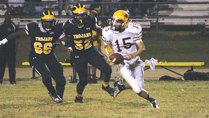 File photo/ Quarterback Zach Hodges will pose as much of a threat with his legs as he will through the air for the Yellow jackets this season.