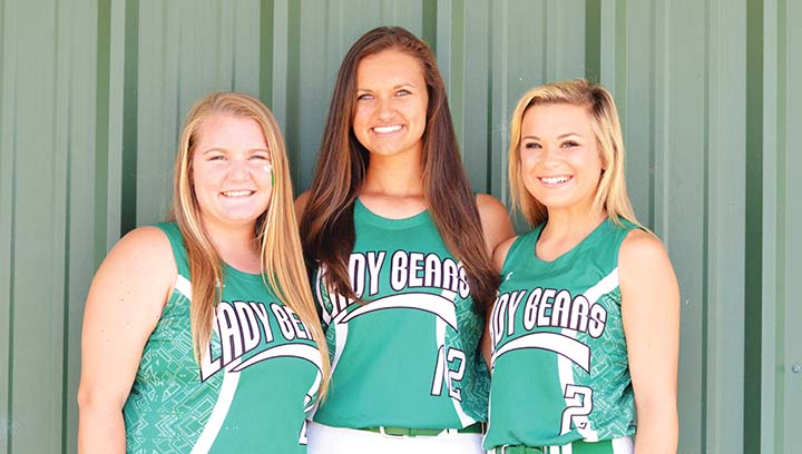 Photo by Anthony McDougle/ Anna Brooke Davis (left), Makennah Redd and Sara Jane Doty are seniors on West Lincoln’s slow-pitch softball team.