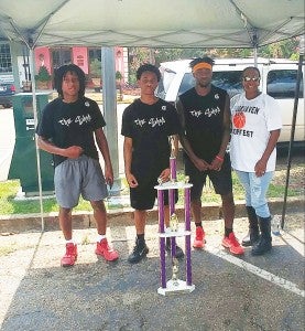 Photo submitted/ Richard Marshall (left), Keith Roberson and Debo Brooks of  The Bank of Brookhaven team won the Brookhaven Hoopfest 3-on-3 title last weekend  for the 15-17-year-old group.  Also pictured is Cynthia Price.  