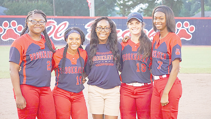 Photo submitted /The Brookhaven Panthers slow-pitch softball team honored its seniors during a doubleheader against North Pike Monday night. Senior members of the team are (from left) Jada Henderson, Tia Bussey, team manager Takia Brooks, Macy Ziskin and Cheyenne Motley. Each senior received a rose and gifts from the booster club as well as family members and teammates. Each player also had two members of the team recite a short speech about them.