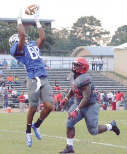 Photo by Anthony McDougle /Co-Lin wide receiver DeAndre Barnes goes up for a catch in the first quarter of a win over MS Delta Thursday night at Stone Stadium. 