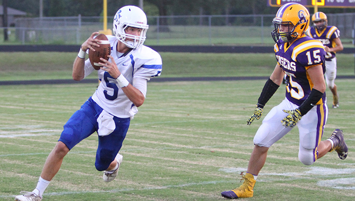 Photo submitted/Brookhaven Academy’s Fisher Warren tries to avoid Wyatt Brabham of Centreville during their game earlier in the year. The Cougars will face Columbia on the road Friday.