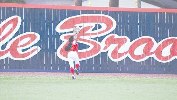 Photo by Anthony McDougle/Senior outfielder Tia Bussey runs down a deep fly ball in Ole Brook’s district-clinching home win over Pearl Tuesday. Bussey also went 3-for-3 on the night with three singles.