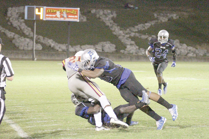 Submitted photo/Co-Lin defensive back Rhoy Williams wraps up a JCJC runner in their game last week. The Wolves will face East Central in Stone Stadium today at 7 p.m.