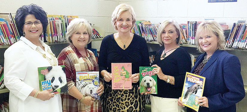 Photo submitted/Lincoln County Republican Women members Cindy Moore, Jennifer Whittier, Karen Sullivan, Patsy Yates and Becky Currie gather for a photo to commemorate their new annual book drive at the Mamie Martin Library recently.