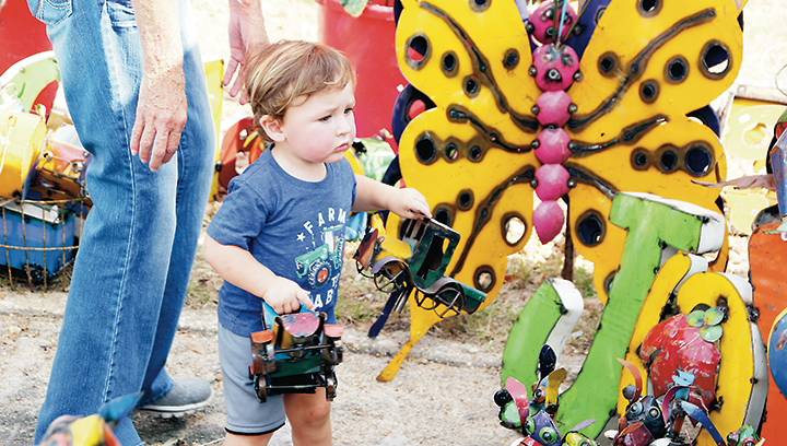 Photos by Alex Jacks/The 45th annual Wesson Flea Market, held in downtown Wesson Saturday, proved to be a success for all involved. Church groups, small businesses, clubs and organizations from across Mississippi staked a spot on Hwy. 51 and the town’s side streets to provide visitors with an array of homemade crafts and foods. The Wesson Volunteer Fire Department will benefit from the event, as the flea market is their biggest fundraiser every year. More photos of the flea market can be see at www.dailyleader.com.