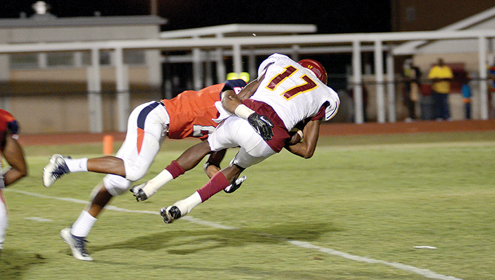 Photo submitted/Brookhavken’s Kenneth Bellamy attempts to stop No. 17 of Laurel, Anthony Jones, from reaching the end zone Friday night.