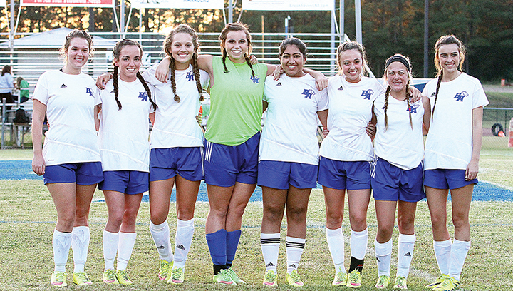Photo by Sherylyn Evans /Brookhaven Academy’s senior players were honored Monday during half time of their win over Copiah. Seniors are (from left) Abby Oliver, Sophie Wilson, Julianna Mills, McKinley Evans, Anna Narang, Anna Morgan Smith, Harley Smith and Shelby Flumm.