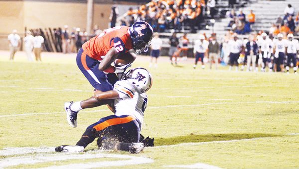 Photo by Anthony McDougle/ Brookhaven wide receiver John Hilbert is wrapped up by a Wayne County defensive back. Hilbert had four catches for 34 yards in the Panthers’ 31-16 loss Friday night.  