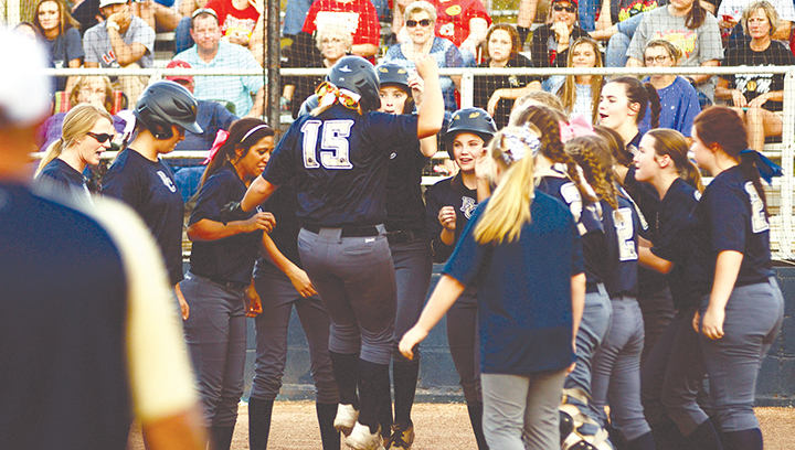 Photo by Anthony McDougle /Bogue Chitto first baseman Reagan Kirkland jumps onto home plate in celabratory fashion after hitting a home run in the South State championship series against Sebastopol earlier this week. Kirkland and the Bobcats face Hamilton in the 1A State Championship Saturday.