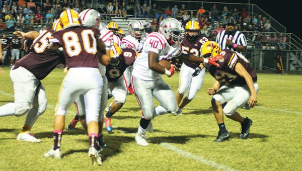 Photo by Lydia King/ Loyd Star’s Zac Arnold attempts to evade Enterprise defenders during the Sting Bowl Friday night.