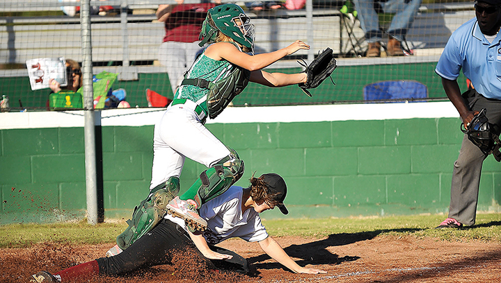 Photo by Teresa Allred/West Lincolns catcher Ashley Tabor misses the tag on a Richton baserunner at home plate in the Bears’ first-round playoff series against the Rebels Tuesday.