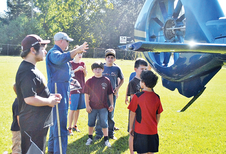 Photo by Aaron Paden/Students from The Reading Nook took a field trip Thursday to the Exchange Club Park to learn about the LifeFlight 4 medical helicopter.