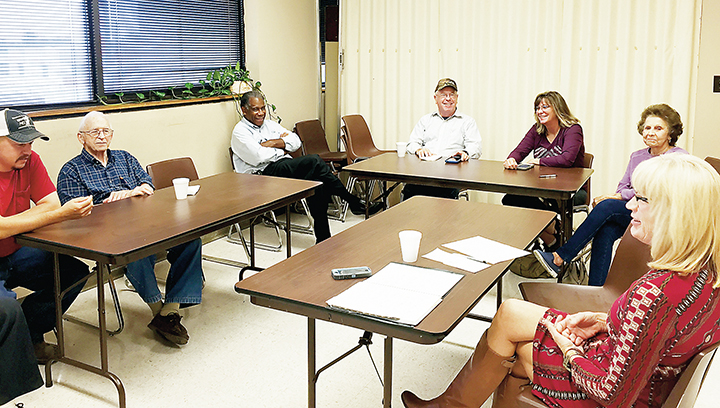 Photo by Alex Jacks/Lincoln County Extension Agent Rebecca Bates (right) recently met with a host of local farmers and vendors to discuss plans for the Thanksgiving Famers Market Tuesday.
