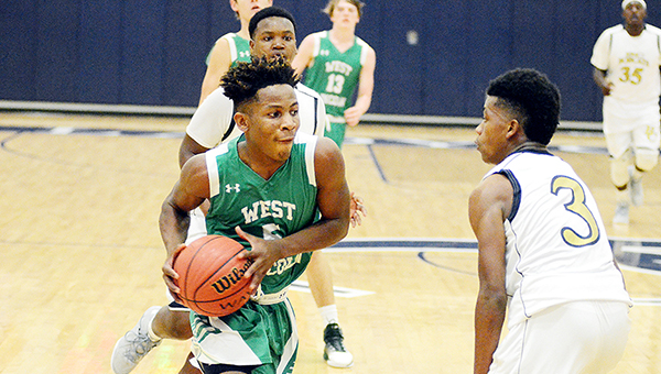 Photo by Dylan Rubino/West Lincoln’s LaDarris Jones (5) drives to the basket Tuesday night against Bogue Chitto.