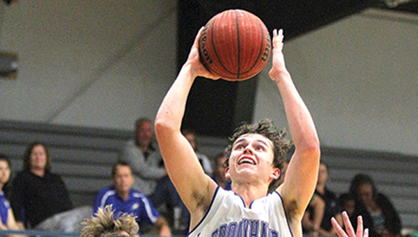 Photo by Sherylyn Evans/BA’s Ethan Nations going up for the shot over Ben’s Ford’s C.J. McClelland Tuesday.