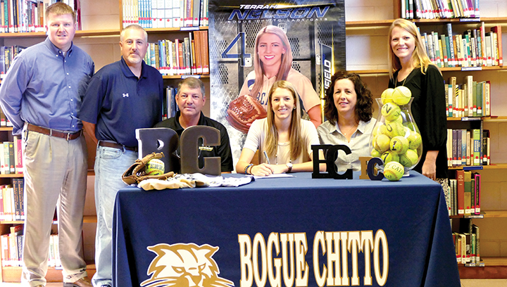 Photo submitted/Bogue Chitto senior Terrah Nelson recently signed a softball scholarship with Southwest Mississippi Community College. Nelson’s plans for college are to major in pre-medicine and enter the medical field in some aspect one day. During her senior year, Nelson has been selected as Miss Bogue Chitto, the Wendy’s Heisman scholar, and the DAR Good Citizen. She was also honored as a 2016 MHSAA fast-pitch and slow-pitch all star. She is pictured with her parents, Gary and Kim Nelson of Bogue Chitto. Also pictured with Terrah are her coaches, Scott and Denise Leggett, and principal, Jay Rayborn.
