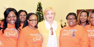 Photo by Kristopher Coleman/The family of the late Doug Sullivan, including Brookhaven Alderman-at-large Karen Sullivan (in yellow) delivered hot Thanksgiving meals throughout the city. Sullivan’s husband, the mayor of Brookhaven from 1993-97, died in 2007 on his way to work.