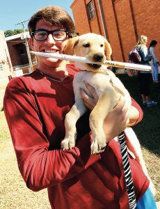 Phi Theta Kappa at Copiah-Lincoln Community College hosted a Pet Therapy Day in 2016. Reid Butler was among those who participated.