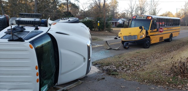 Propane truck overturns in crash with school bus; no injuries reported